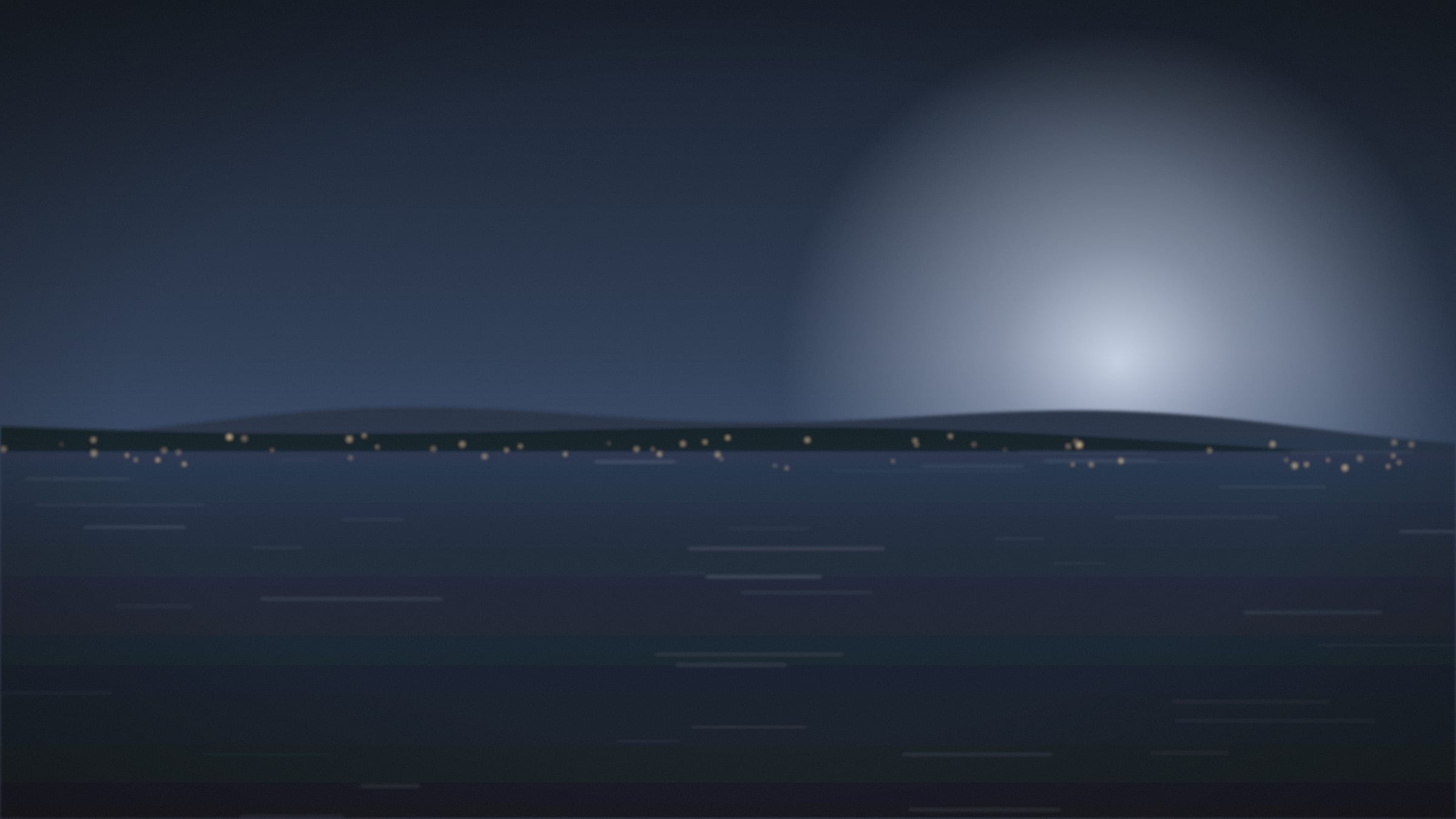 A harbour at night with a line of warm lights