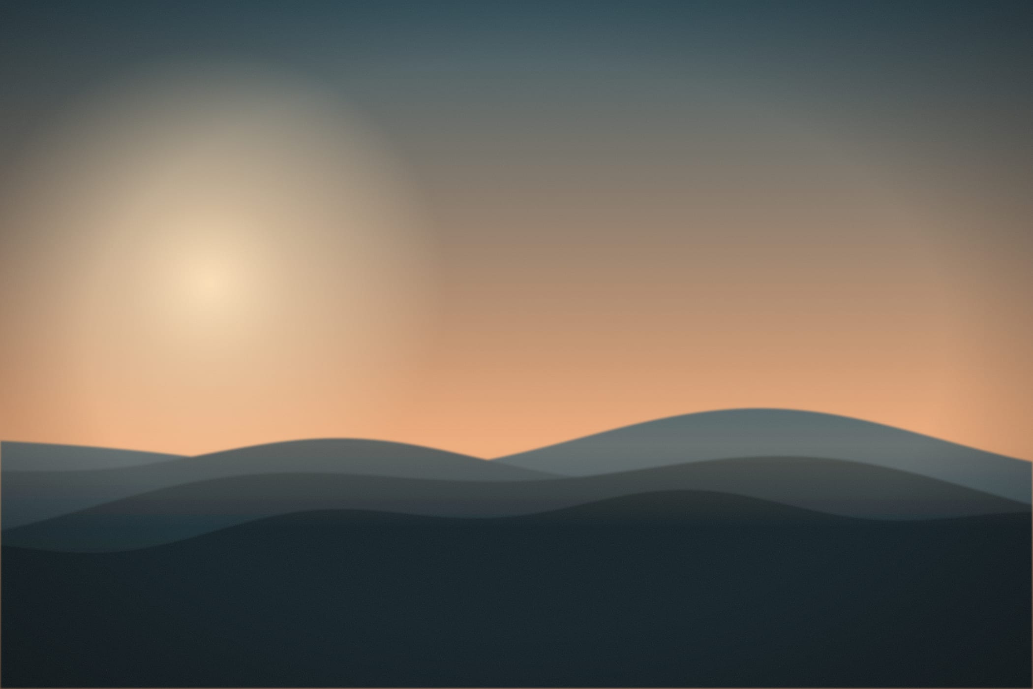 Hills at dusk under a teal sky