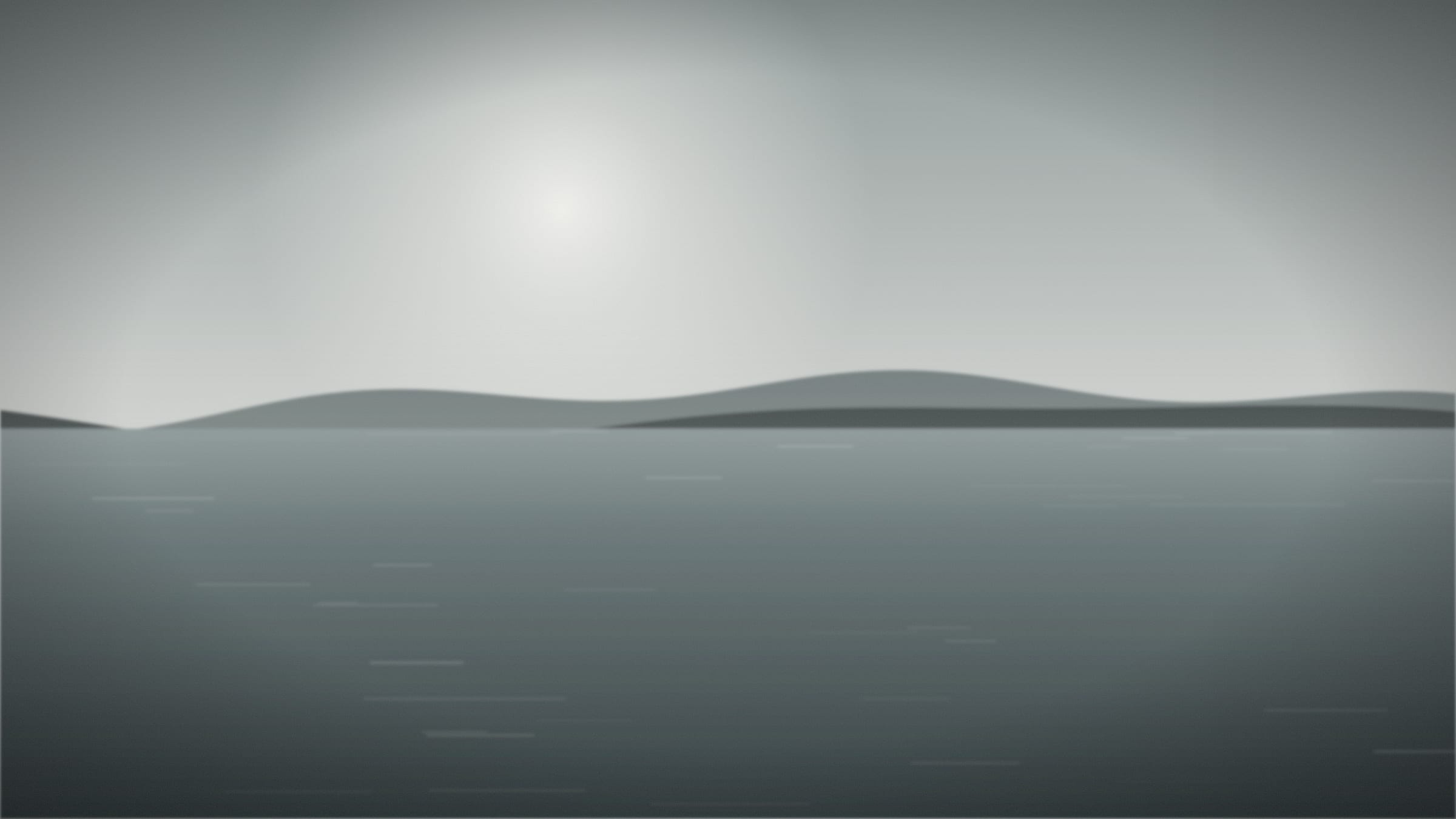 A grey sea under a flat overcast sky